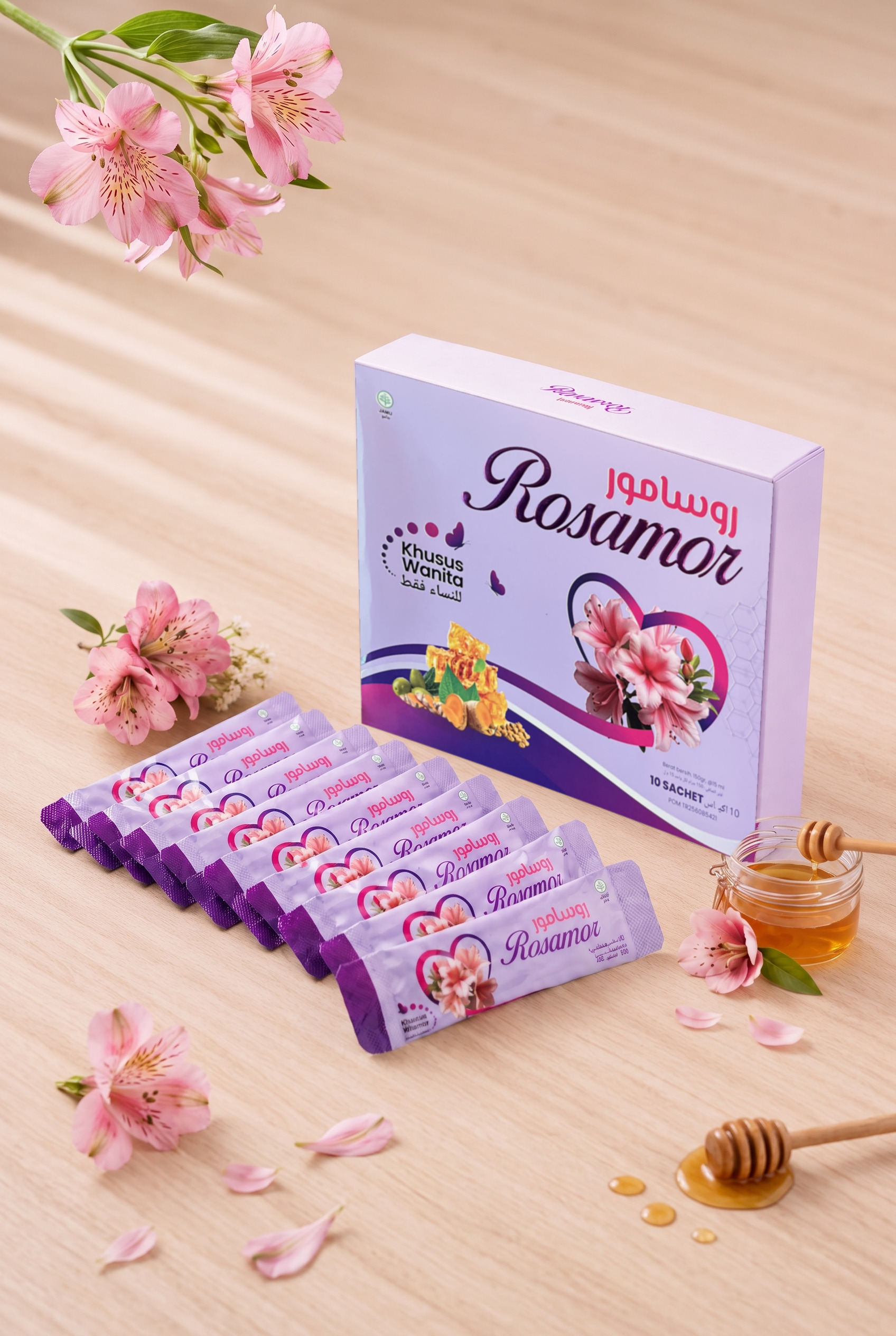 Kemasan Rosamor Care Indonesia dengan sachet, bunga, dan madu